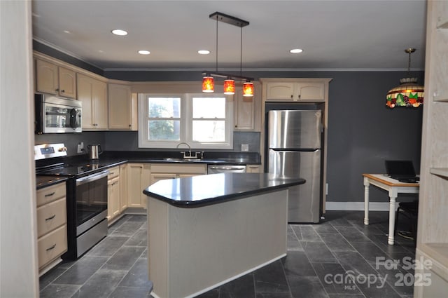 kitchen featuring crown molding, sink, pendant lighting, and appliances with stainless steel finishes