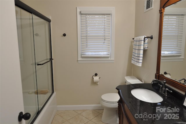 full bathroom with toilet, vanity, tile patterned floors, and combined bath / shower with glass door