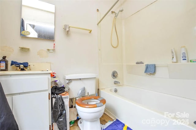 full bathroom with vanity,  shower combination, and toilet