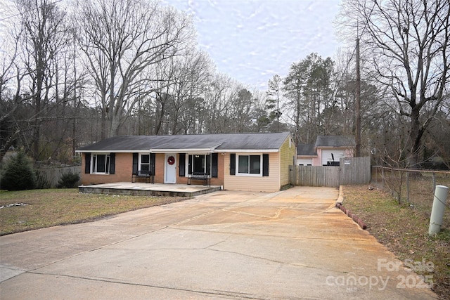 single story home with covered porch