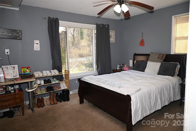 bedroom featuring carpet floors and ceiling fan