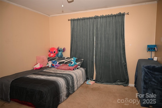 carpeted bedroom featuring crown molding