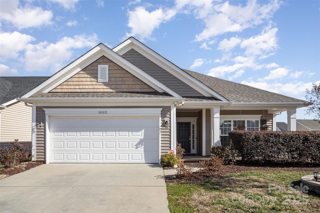 craftsman-style house featuring a garage