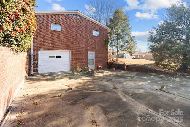 view of home's exterior with a garage