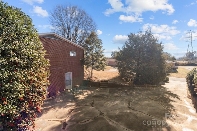 view of home's exterior featuring a patio area