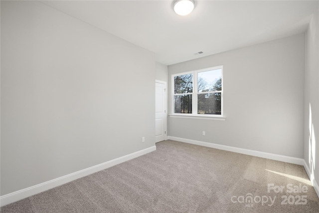 view of carpeted spare room