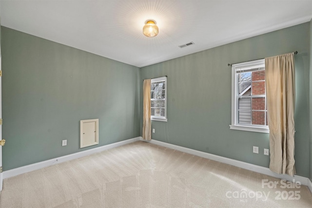 view of carpeted spare room