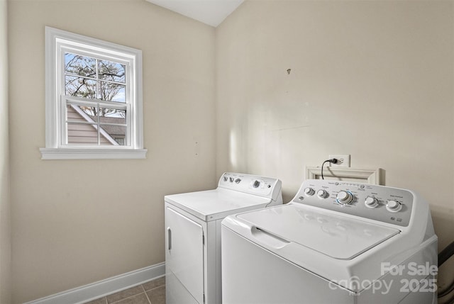 washroom featuring washer and dryer and tile patterned floors