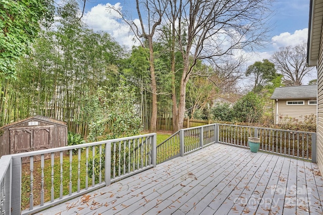 wooden deck featuring a storage shed