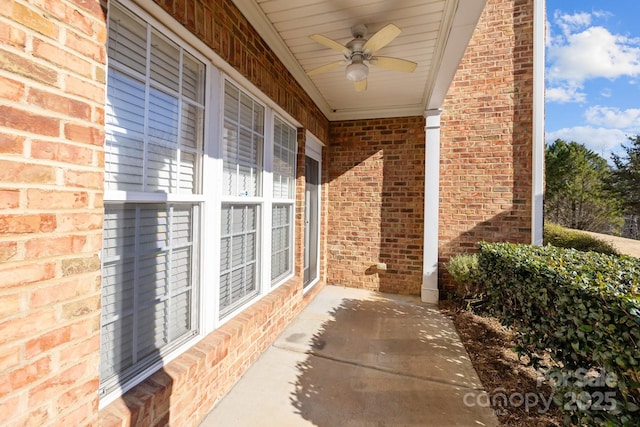 view of patio featuring ceiling fan