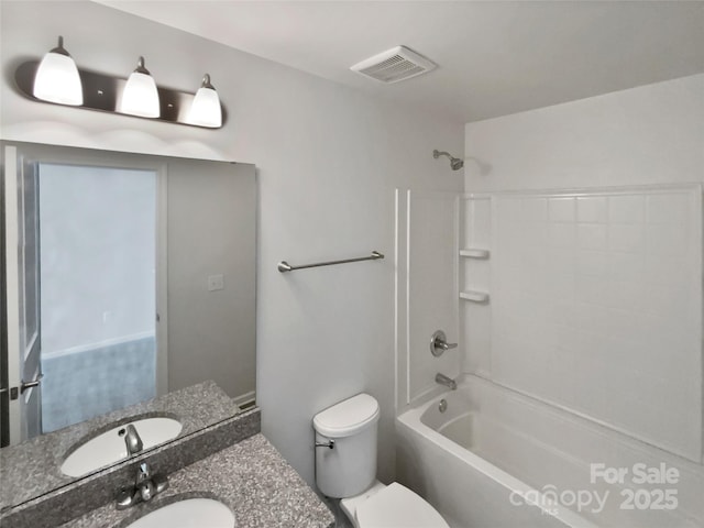 full bathroom featuring vanity, toilet, and shower / bathtub combination