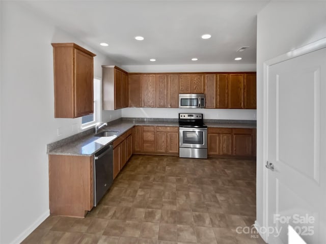 kitchen featuring sink and appliances with stainless steel finishes