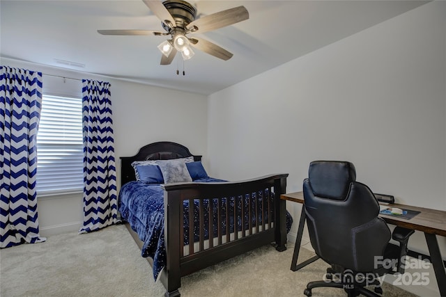 bedroom with carpet, visible vents, ceiling fan, and baseboards