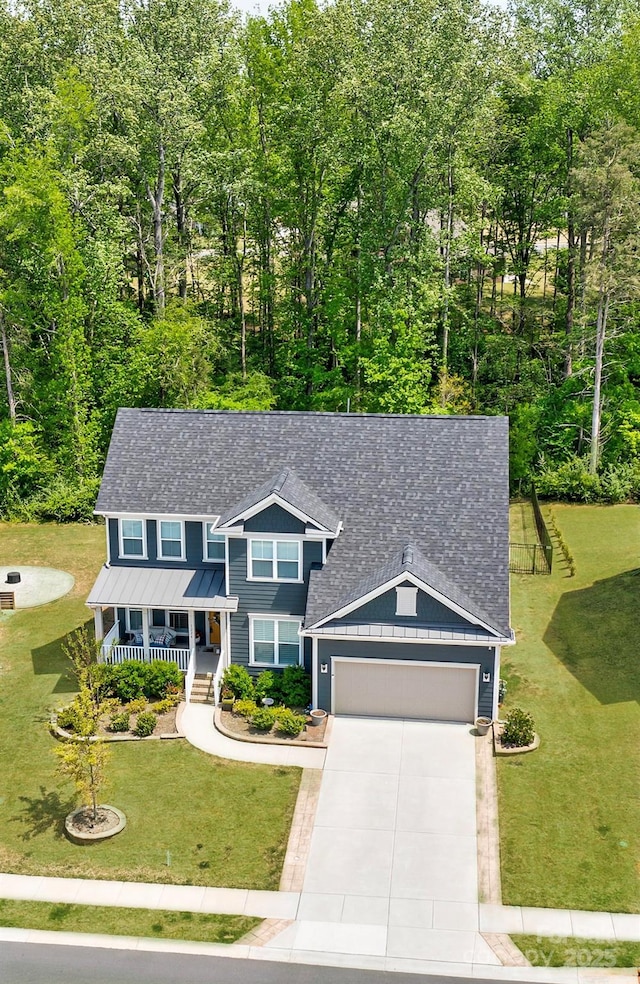 1224 Regions Blvd, Fort Mill, SC 29707 - colonial inspired home featuring covered porch, a front yard, a shingled roof, concrete driveway, and an attached garage