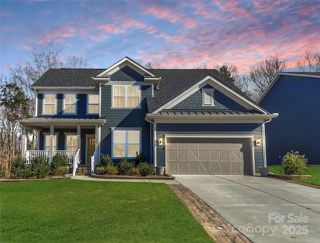 1224 Regions Blvd, Fort Mill, SC 29707 - craftsman house featuring a garage, a standing seam roof, concrete driveway, a porch, and a yard