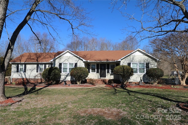 ranch-style home with a front yard