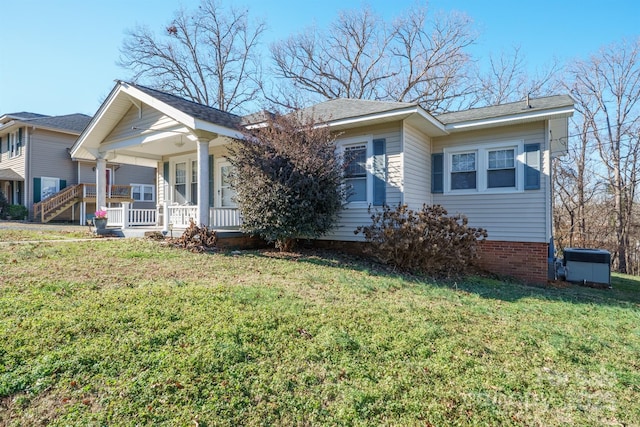 view of front of home featuring a porch and a front yard