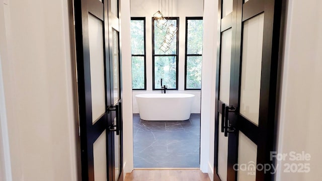 bathroom with a bathing tub