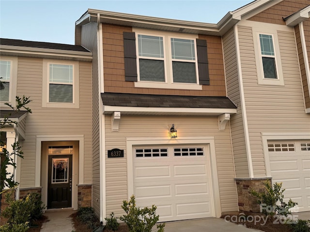 view of property featuring a garage