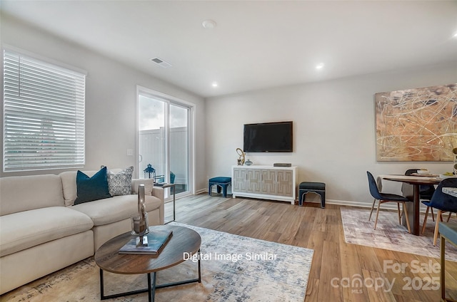 living room with hardwood / wood-style floors