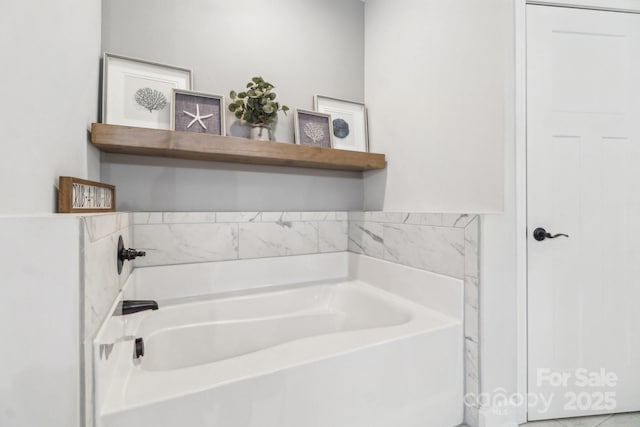 bathroom featuring a tub