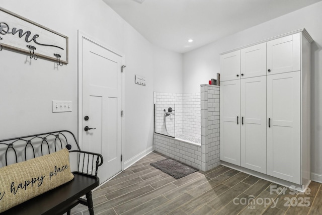 bathroom featuring a shower