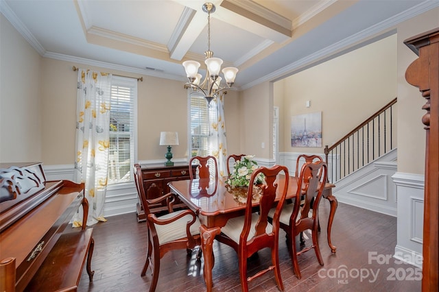 dining space featuring dark wood-type flooring, crown molding, an inviting chandelier, and beamed ceiling