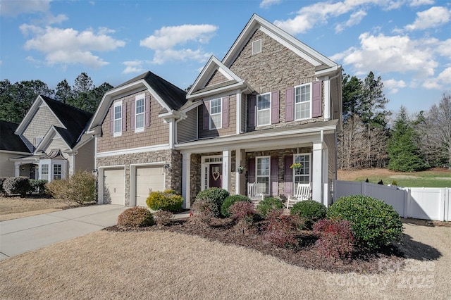 craftsman-style home featuring a garage and a porch