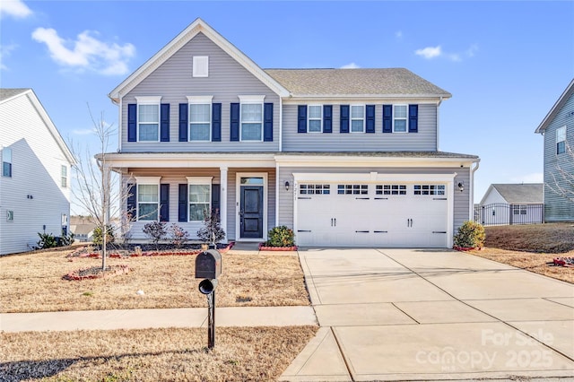 front facade featuring covered porch and a garage