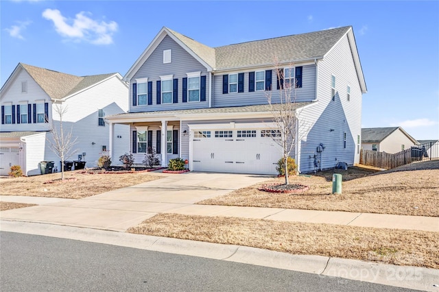 view of front property featuring covered porch and a garage