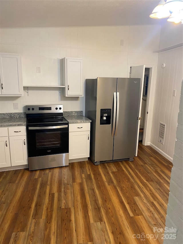 110 Heywood Rd Unit 20, Arden, NC 28704 - kitchen with appliances with stainless steel finishes, white cabinetry, and dark wood-style floors