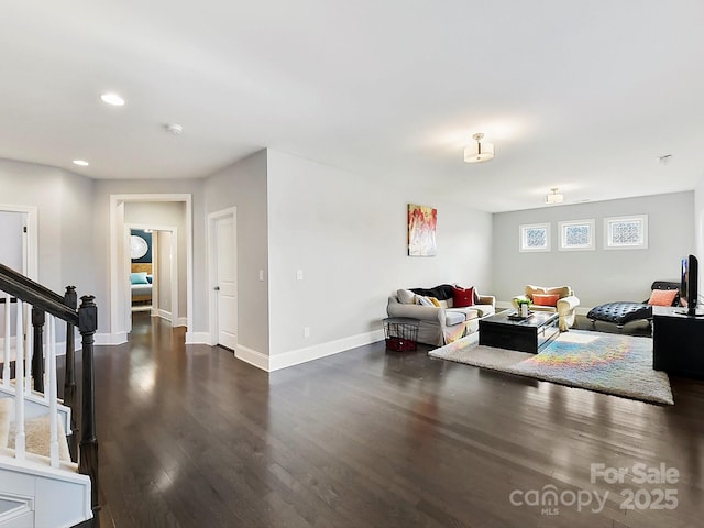 living room featuring dark hardwood / wood-style floors