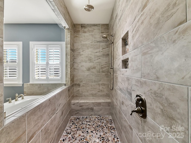 bathroom featuring tiled shower