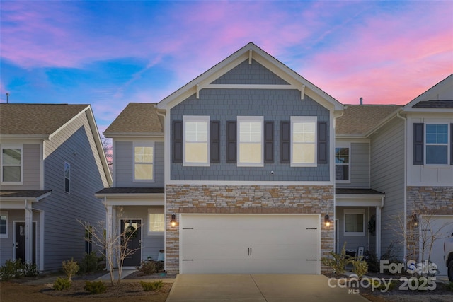 view of front of property featuring a garage