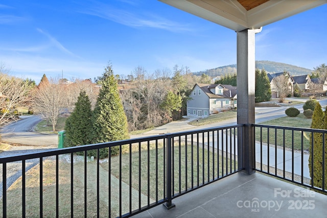 balcony featuring a mountain view