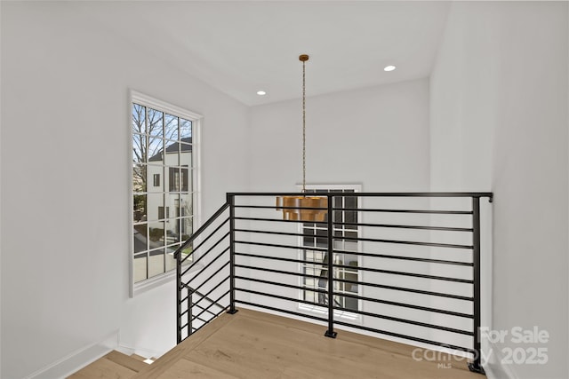 staircase featuring hardwood / wood-style flooring