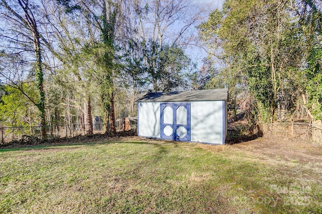 view of outdoor structure with a yard