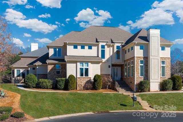 view of front of property featuring a front yard