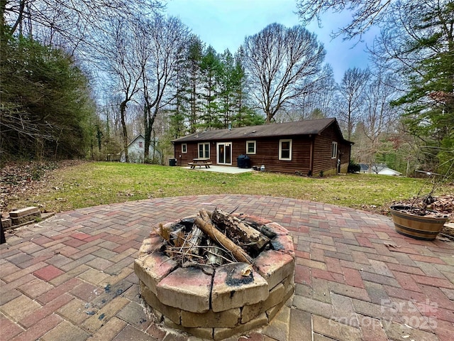 view of patio featuring a fire pit