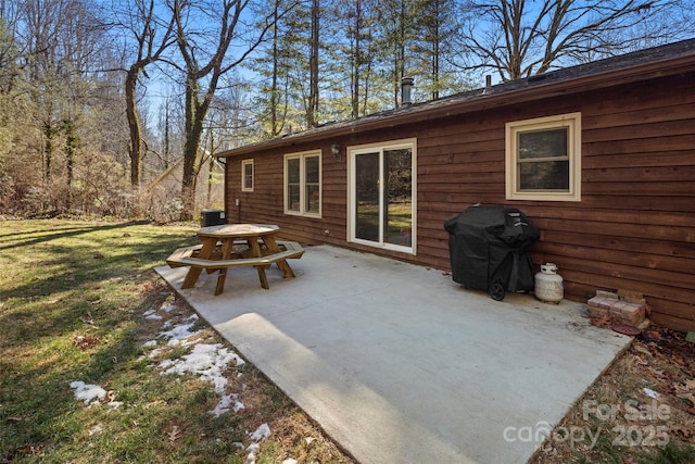 view of patio featuring central air condition unit and area for grilling