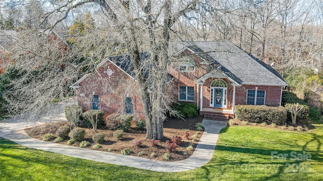 view of front of house with a front lawn