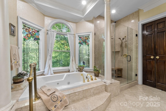 bathroom featuring decorative columns, tile patterned flooring, shower with separate bathtub, and ornamental molding