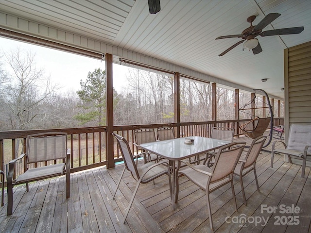 wooden deck with ceiling fan