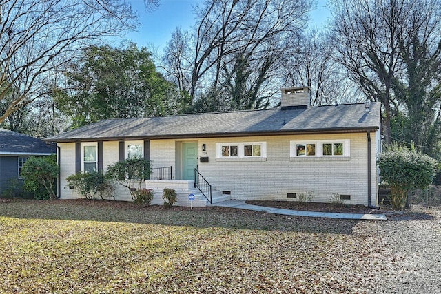 ranch-style home featuring a front lawn