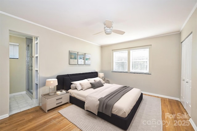 bedroom with ornamental molding, a closet, ceiling fan, and light hardwood / wood-style flooring