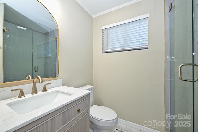 bathroom featuring ornamental molding, toilet, vanity, and walk in shower