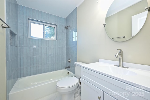 full bathroom with tiled shower / bath combo, vanity, and toilet