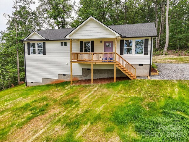 474 Hague Dr, Columbus, NC 28722 - back of property featuring crawl space, a lawn, stairs, a shingled roof, and covered porch