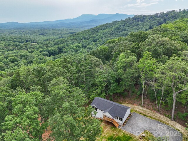 474 Hague Dr, Columbus, NC 28722 - view of subject property featuring a heavily wooded area and mountains