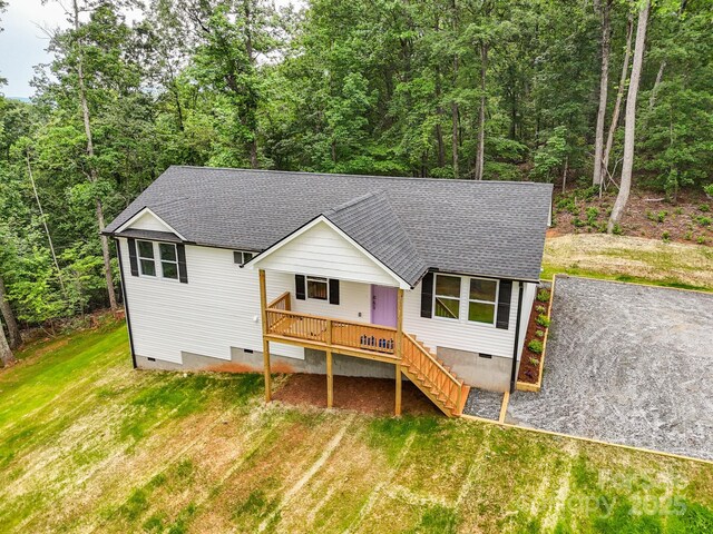 474 Hague Dr, Columbus, NC 28722 - view of front of property featuring crawl space, a shingled roof, a front yard, and stairway
